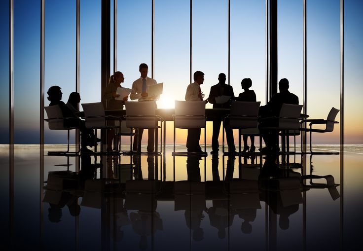 business people working in a conference room.